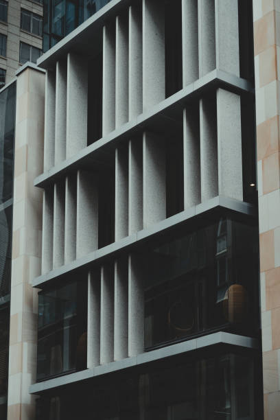 istock Modern geometric city building exterior 1306933751