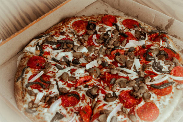 istock Pepperoni and mushroom pizza detail 1306937806
