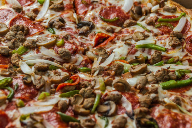 istock Pepperoni and mushroom pizza detail 1306938547