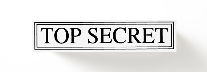 “TOP SECRET” rubber stamp, isolated on white background with clipping path.