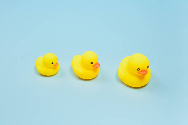 istock Child's toy  duckling,children's day background 1306941214