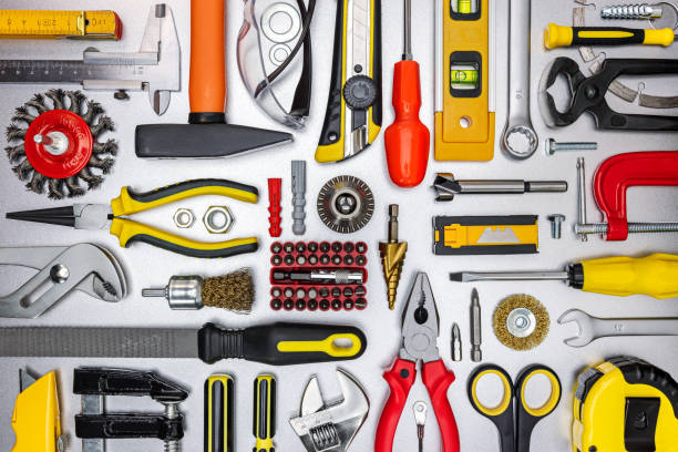 istock mechanic work tools for home renovation on grey metallic background. flat lay 1306946619