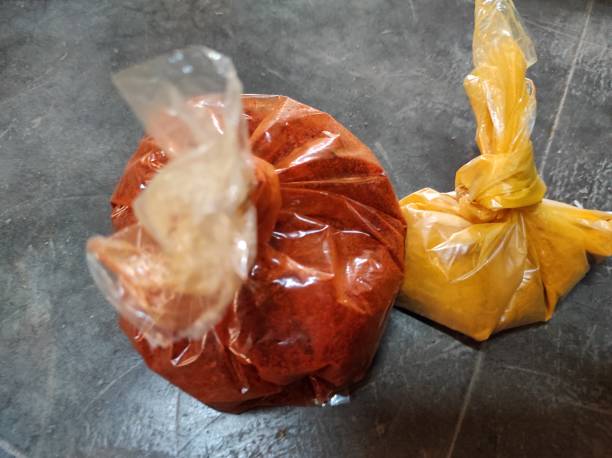 istock Turmeric powder and chili powder 1306954390