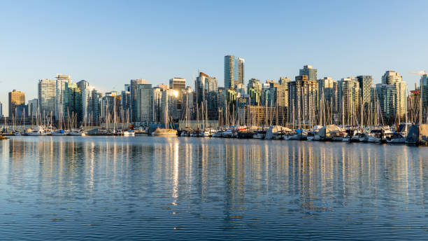 istock Vancouver downtown skyline panoramic view at sunset time. Canada. 1306959753