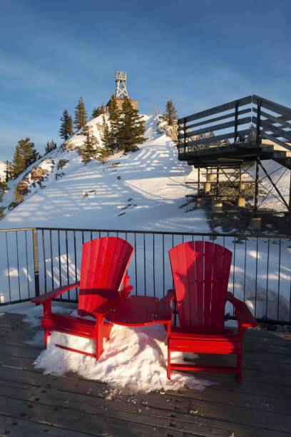 istock Red Adirondack Chairs at Sulphur Mountain, Banff Canada 1306959978