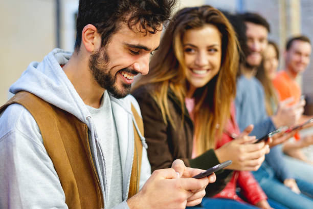istock Cool man watching a funny video and having fun 1306966256