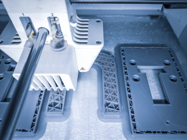 istock D printer, printing with plastic wire filament in additive manufacturing technique 1306970191