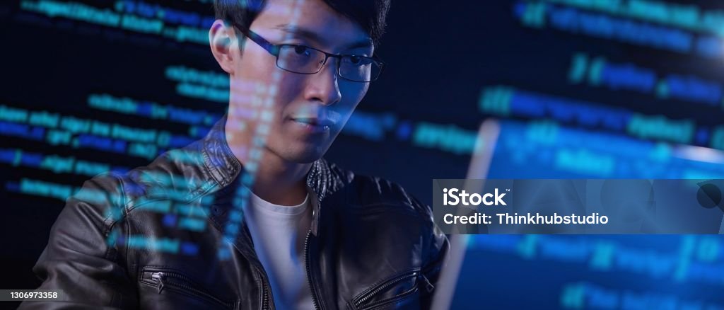 Asian Man Computer Engineer Programmer Typing Code Hacking Using ...