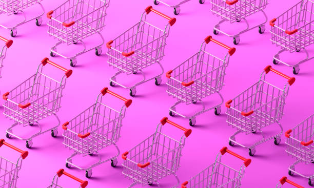 istock Shopping cart pattern on pink background 1306977532
