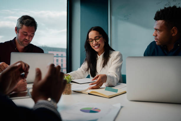 istock Multi ethnic business people working together in the modern office 1306977978