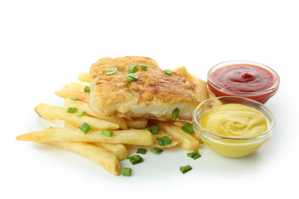 istock Fried fish and chips, and sauces isolated on white background 1306978234