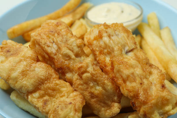 istock Plate with fried fish and chip, close up 1306978243