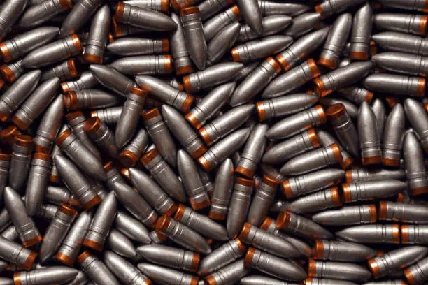 Photo of Pattern of bullet. Many lead bullets with copper bottom