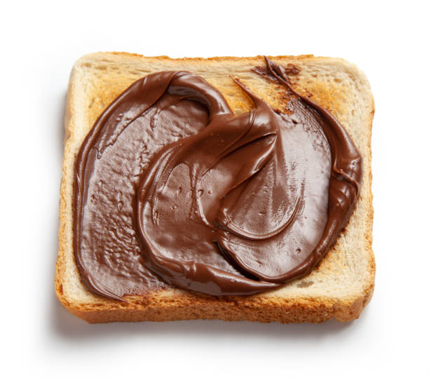 istock toasted bread slice with chocolate hazelnut cream isolated on white background, top view 1306985438