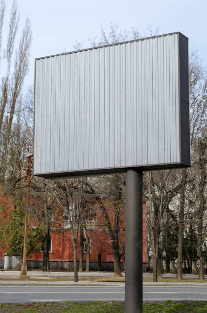 istock A gray, empty billboard on a city street. 1306988286