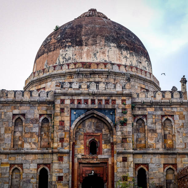 istock Mughal Architecture inside Lodhi Gardens, Delhi, India, Arches Inside the The Three-domed mosque in Lodhi Gardens is said to be the Friday mosque for Friday congregations 1306995628