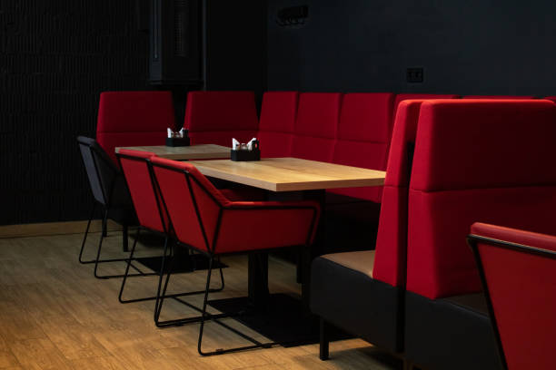 istock Tables and chairs in cafe in dark 1306995804