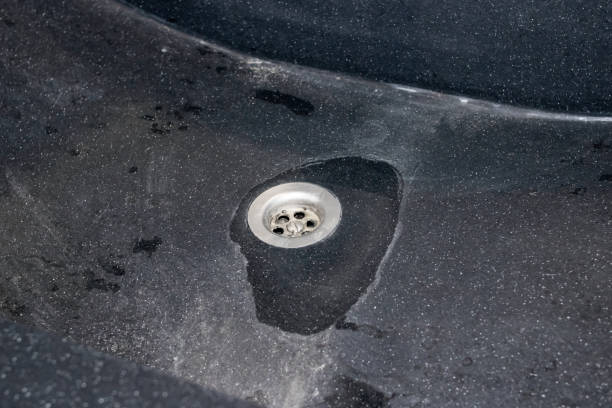 istock Gray old marble sink in toilet closeup 1306996419
