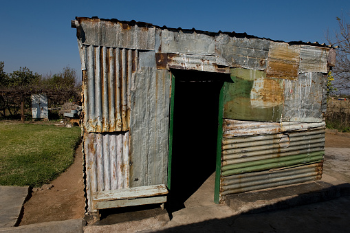 A characterful tool shed built from recycled corrugated iron sheets in the village of Mapoch, Nort West Province South Africa