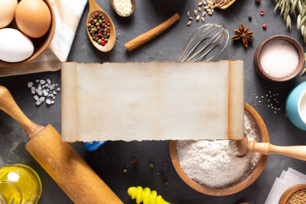 istock Bakery ingredients for homemade bread baking on table. Baker set at table background texture. Flat lay top view 1306999112