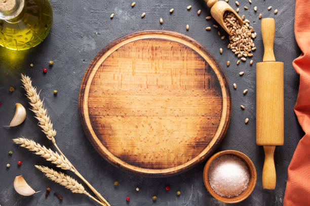 istock Bakery ingredients for homemade bread baking on table. Baker set at table background texture. Flat lay top view 1306999176