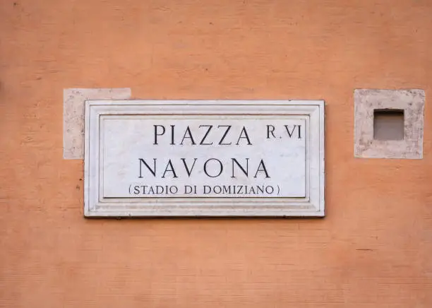 Street name sign of Piazza Navona (Navona's Square) in Rome, Italy.
