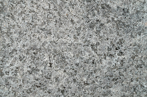 Grey stone concrete mottled texture background