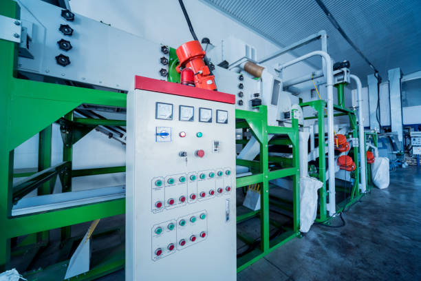 istock Modern equipment for peeling and roasting sunflower seeds 1307001386