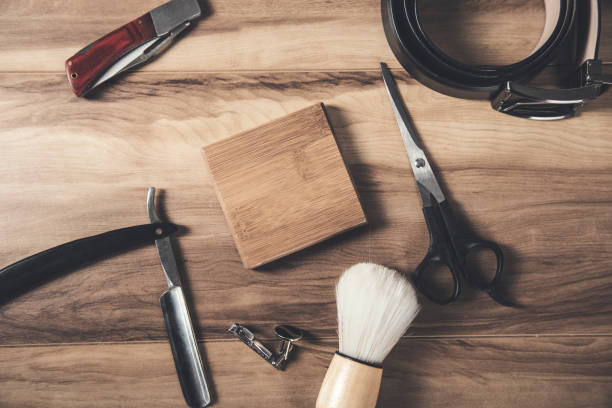 istock shaving accessories and belt on table 1307002826