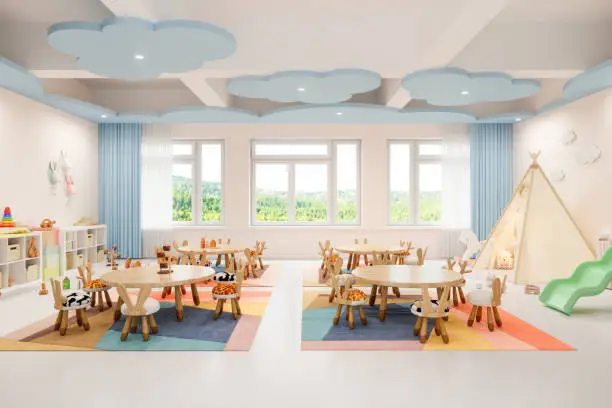 Interior of a modern empty preschool classroom.