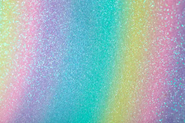 Iridescent rainbow background with glitter
