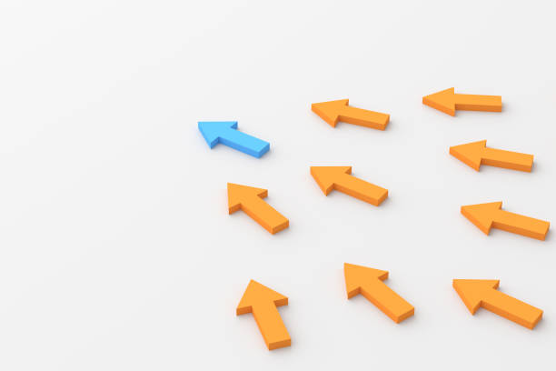 istock Leadership concept, blue leader arrow leading orange arrows, on white background with empty copy space 1307007411