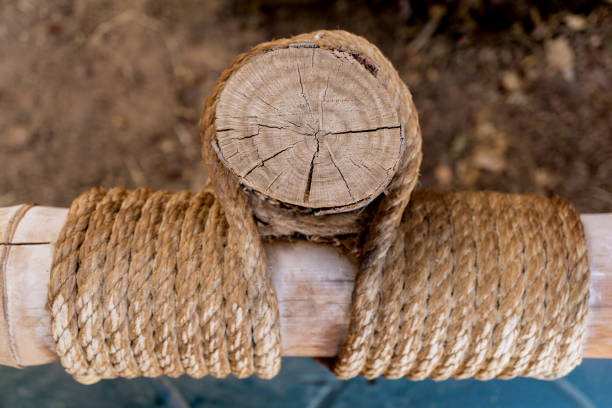 Bamboo poles tied by a thick rope.