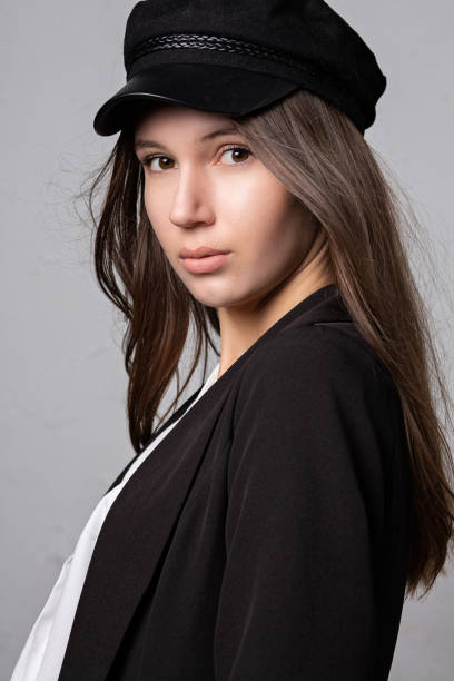 istock Adorable model wears stylish outfit posing at the studio 1307009876