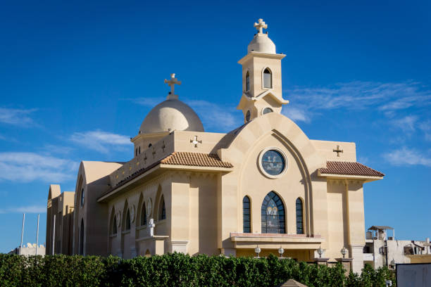 istock Public cathedral coptic egyptian church at the sky background 1307009935