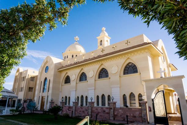 istock Public cathedral coptic egyptian church at the sky background 1307010767