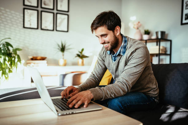 istock Businessman working from home and ordering food on website 1307013582