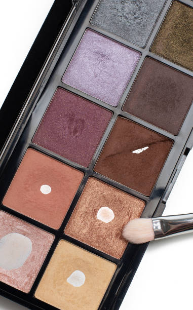 istock Used palette of eye shadows with a brush 1307016171