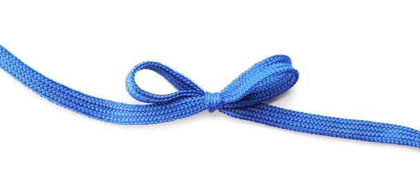 Blue shoe lace tied in bow isolated on white, top view