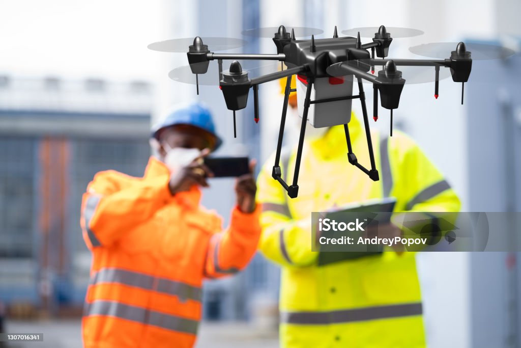 Industrial Unmanned Drone Survey And Discovery Industrial Unmanned Drone Survey, Monitoring And Discovery Construction Site Stock Photo