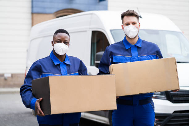 Mover Men Loading Delivery Van stock photo