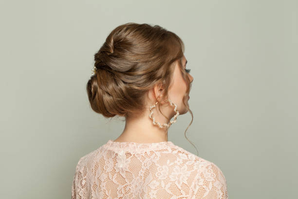 1,905 Top Knot Hair Stock Photos, Pictures & Royalty-Free Images - iStock |  Hair bun, Wavy hair, Top bun hair