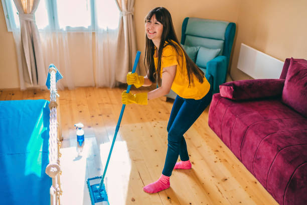 istock Woman is mopping wooden floor 1307023804