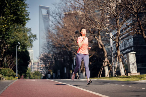 istock Young asian women exercising outdoors 1307026663