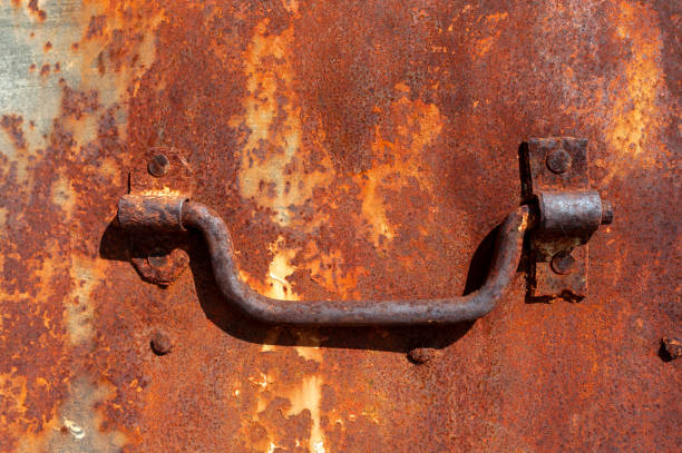 Rusty door, Doorknob stock photo