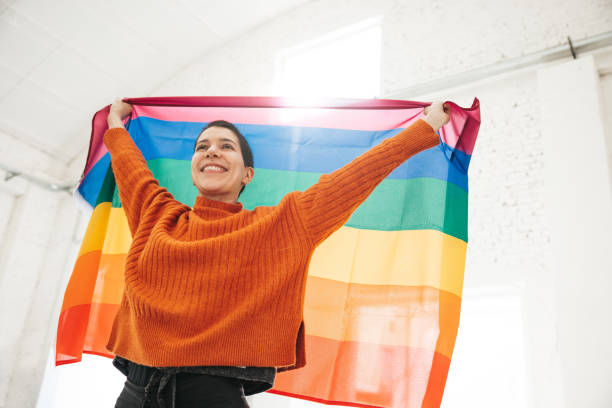 istock Woman stands for LGBTQIA rights 1307030219