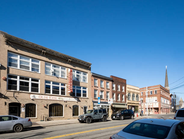 View of the shops and cafes on West Main Street in Franklin Square Middletown, NY - USA - Mar 13, 2021: View of the shops and cafes on West Main Street in Franklin Square, Middletown's downtown shopping district. logan west stock pictures, royalty-free photos & images