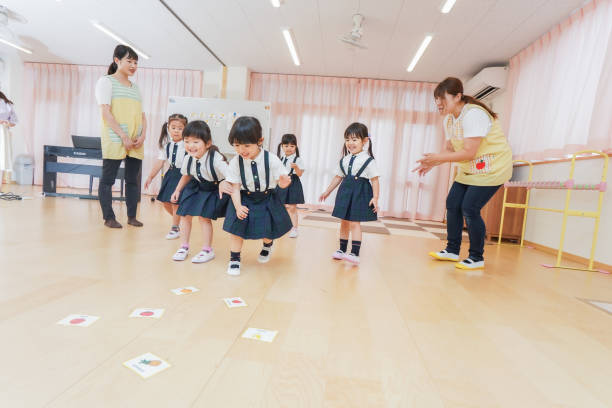 istock Children playing with preschool teacher 1307037338
