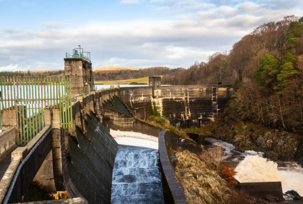 Water being released from the flood gates on Earlstound Dam, Galloway Hydro Electric Scheme, Scotland stock photo