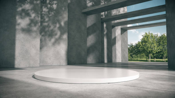 istock White podium for products show in concrete hallway with park background. 1307040064